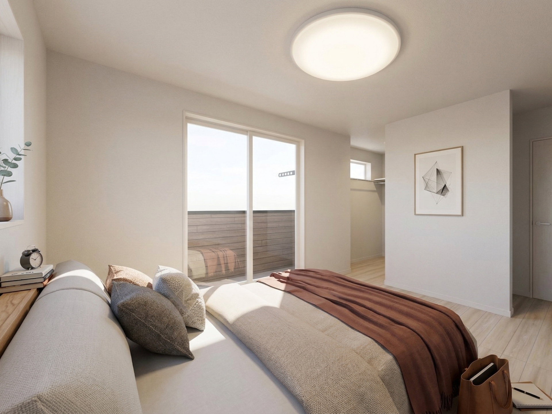 バルコニーへと繋がる大きな窓と奥には大容量のウォークインクローゼットを配置した主寝室