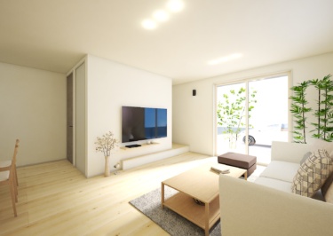 キッチン側からリビングと、奥に2階へ繋がる階段