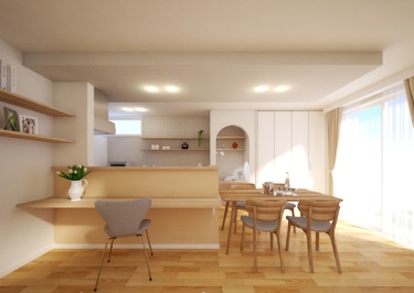 キッチンの下がり天井と、リビングの吹抜けが生み出す奥行きを感じさせます