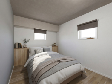 枕元のカウンターは、スマートフォンや小物を置くのに便利な、機能性を追求した寝室。