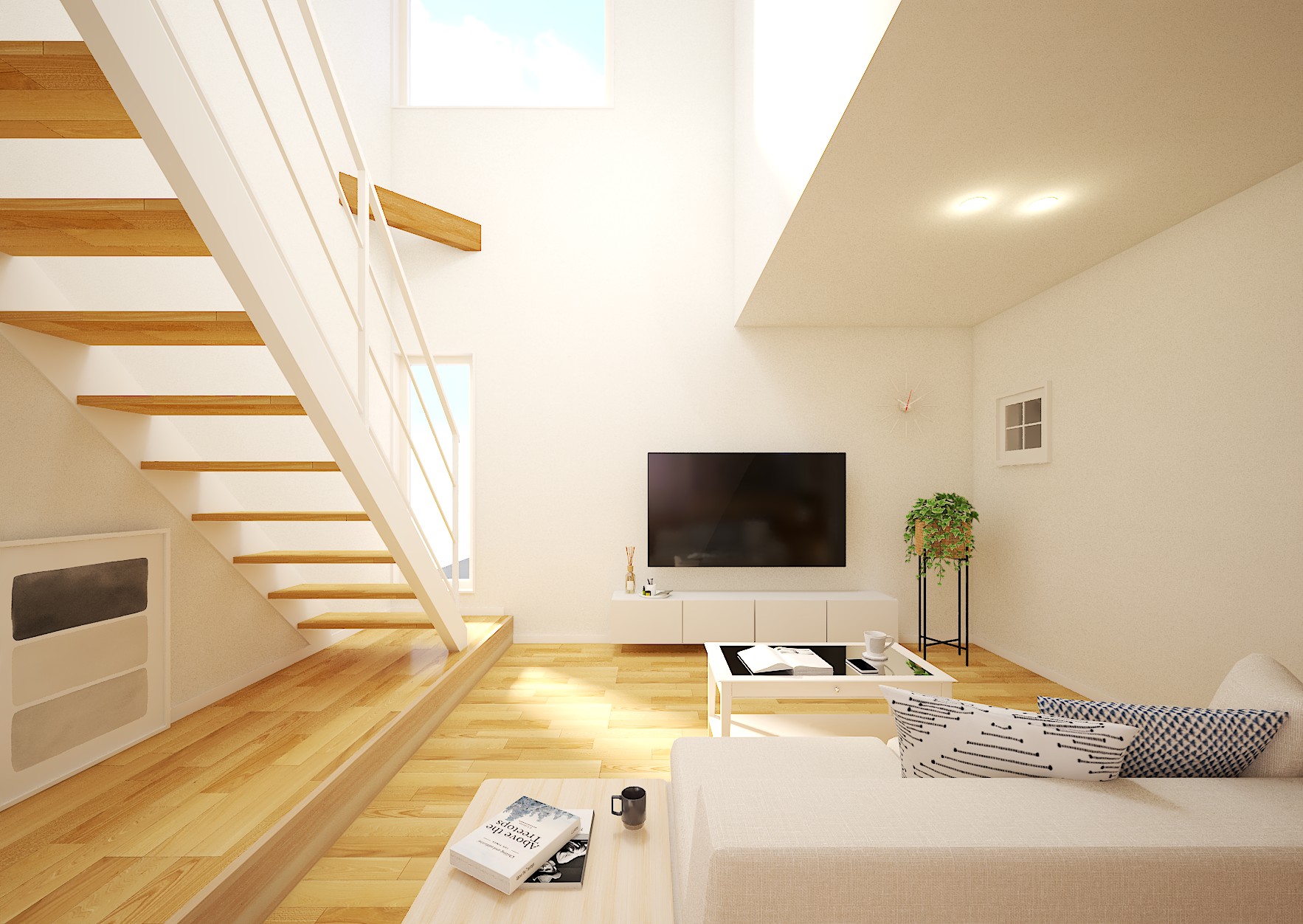 吹抜けと鉄骨階段で開放的な空間