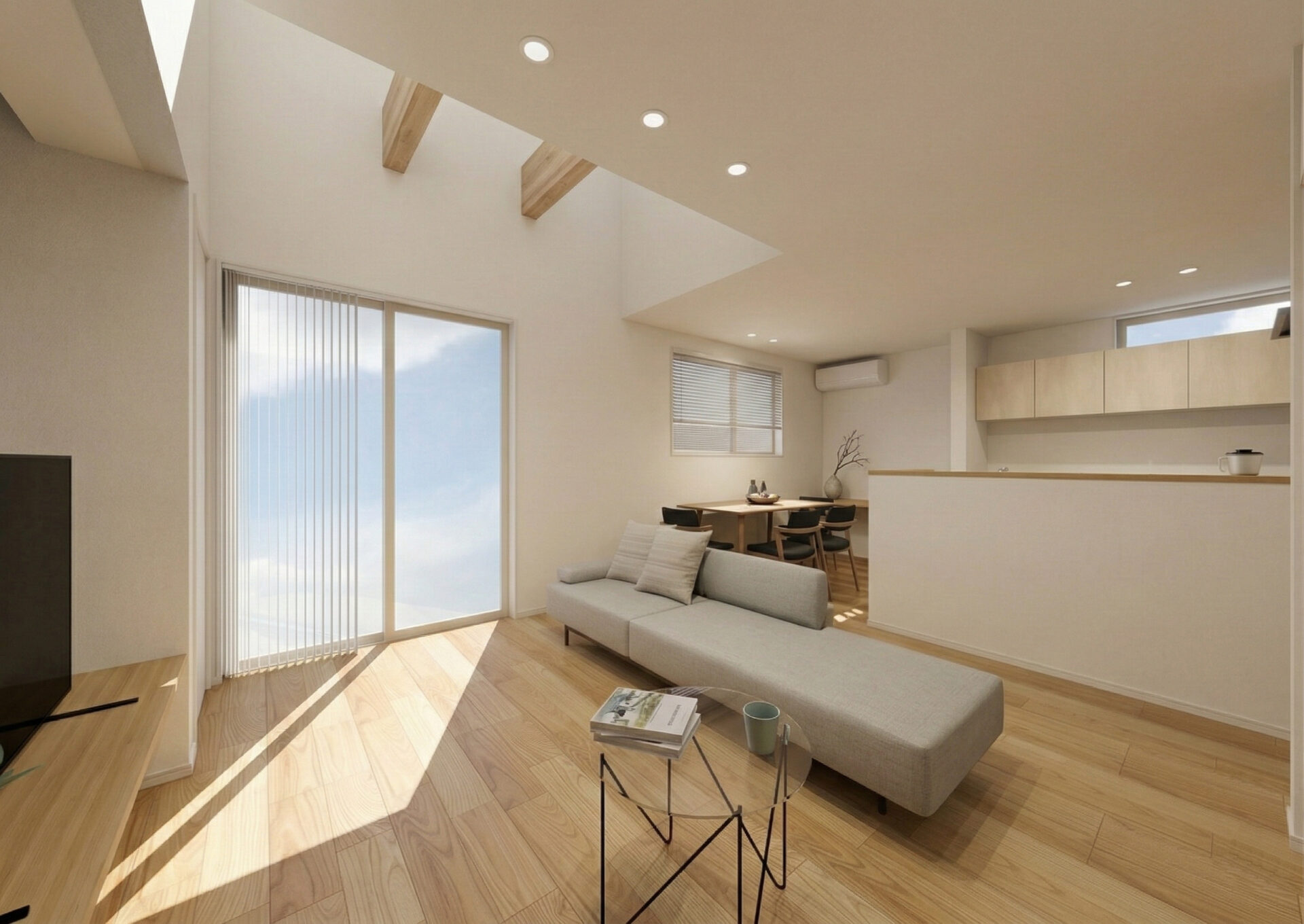 吹抜けと梁あらわしを施した開放感あるLDK①