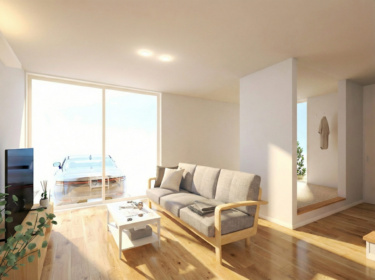 リビングの窓を介して外とのつながりを感じさせる、開放感抜群の設計