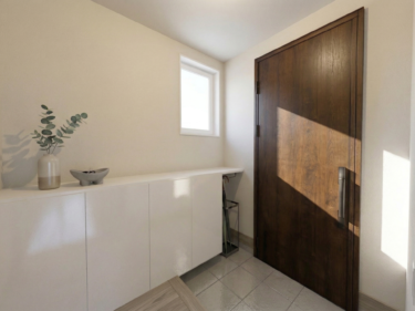 重厚感のある木目調のドアと、清潔感あふれるホワイトのコントラスト